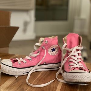 Pink High-Top Converse sneakers